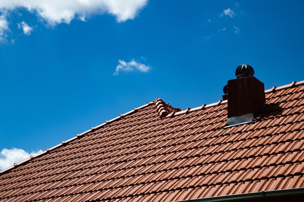 new red tiles roof and blue sky